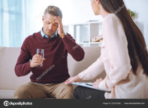 depositphotos_220270366-stock-photo-male-patient-glass-water-having