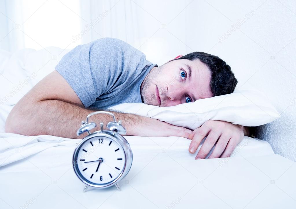 depositphotos_39069421-stock-photo-man-in-bed-with-eyes